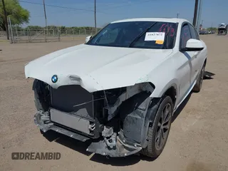 2025 BMW X4 xDrive30i z VIN 5UX33DT05S9X68660, wystawiony jako IAAI lot #41827872 z przebiegiem 8020 mil mil oraz . Historia ofert i sprzedaży dostępna na DreamBid. Obrazek 2.