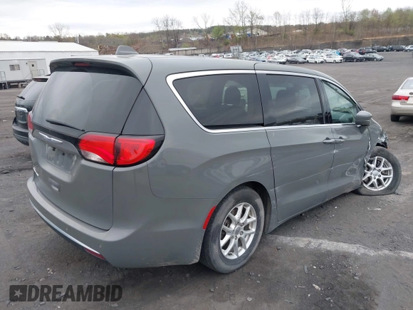 2020 Chrysler Pacifica Touring with VIN 2C4RC1FG3LR245765, listed as a IAAI auction lot 42069689 with 40,869 mi miles and . Bid and sale history available at DreamBid. Image 4.