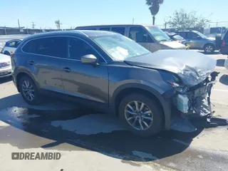 2018 Mazda CX-9 Sport with VIN JM3TCABY4J0225267, listed as a IAAI auction lot 41787981 with 63,883 mi miles and . Bid and sale history available at DreamBid. Image 1.
