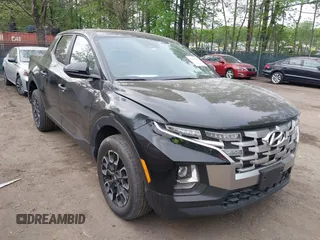 2022 Hyundai Santa Cruz SEL z VIN 5NTJBDAEXNH022728, wystawiony jako IAAI lot #42077941 z przebiegiem 21 191 mil mil oraz . Historia ofert i sprzedaży dostępna na DreamBid. Obrazek 1.