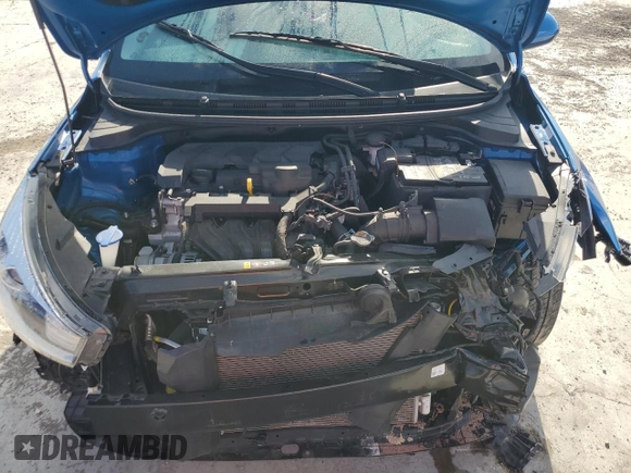 2023 Kia Rio S with VIN 3KPA25AD9PE548173, listed as a Copart auction lot 50232915 with 26,668 mi miles and Salvage Title. Bid and sale history available at DreamBid. Image 12.