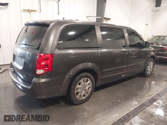 2015 Dodge Grand Caravan SE with VIN 2C4RDGBG2FR643477, listed as a IAAI auction lot 41955909 with 451,432 mi miles and . Bid and sale history available at DreamBid. Image 4.