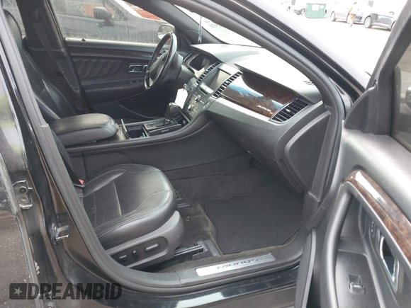 2013 Ford Taurus Limited with VIN 1FAHP2F80DG114817, listed as a IAAI auction lot 41429111 with 207,104 mi miles. Bid and sale history available at carsss.com. Image 5.