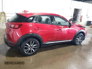 2017 Mazda CX-3 Grand Touring z VIN JM1DKFD70H0148182, wystawiony jako Copart lot #59032435 z przebiegiem 70 166 mil mil oraz Szkoda całkowita • Salvage title. Historia ofert i sprzedaży dostępna na DreamBid. Obrazek 3.