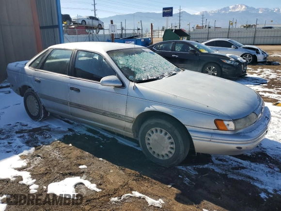 1993 Ford Taurus with VIN 1FACP5242PG162676, listed as a Copart auction lot 45177445 with 73,771 mi miles and Non repairable. Bid and sale history available at DreamBid. Image 4.