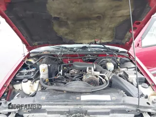 2000 Chevrolet Blazer LT z VIN 1GNDT13W9Y2133636, wystawiony jako IAAI lot #42066871 z przebiegiem Nie podano mil oraz . Historia ofert i sprzedaży dostępna na DreamBid. Obrazek 10.