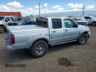 2002 Nissan Frontier SE with VIN 1N6ED27T12C300358, listed as a Copart auction lot 45379885 with 54,273 mi miles and Salvage title. Bid and sale history available at DreamBid. Image 3.
