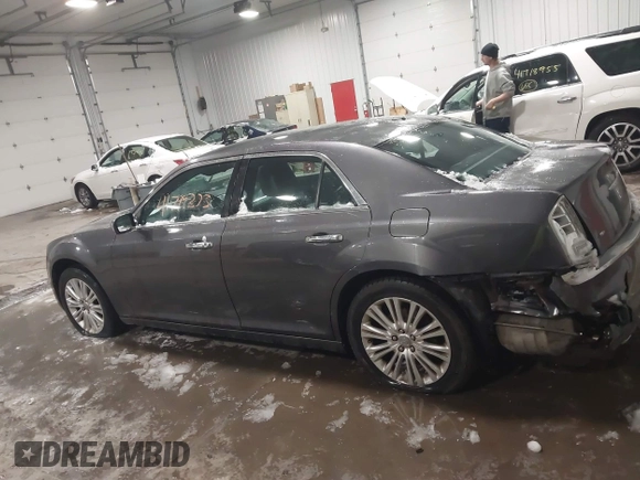 2014 Chrysler 300 C with VIN 2C3CCAKG8EH345577, listed as a IAAI auction lot 41719373 with 152,081 mi miles and . Bid and sale history available at carsss.com. Image 14.