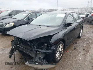 2016 Ford Focus SE z VIN 1FADP3F25GL386582, wystawiony jako IAAI lot #41097395 z przebiegiem 101 479 mil mil oraz . Historia ofert i sprzedaży dostępna na DreamBid. Obrazek 2.
