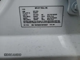 2025 Tesla Model Y Long Range with VIN 7SAYGDED1SF248427, listed as a Copart auction lot 43988825 with 1,891 mi miles and Salvage Title. Bid and sale history available at DreamBid. Image 14.
