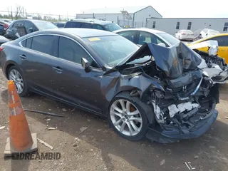 2016 Mazda 6 i Touring with VIN JM1GJ1V51G1433644, listed as a IAAI auction lot 42066262 with 95,546 mi miles and . Bid and sale history available at carsss.com. Image 1.