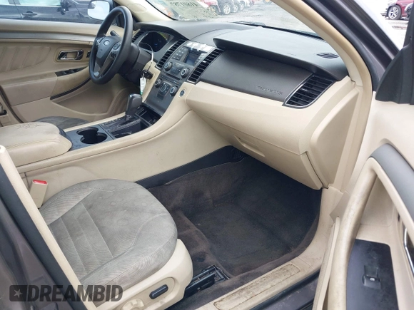 2014 Ford Taurus SE z VIN 1FAHP2D88EG143275, wystawiony jako IAAI lot #41801787 z przebiegiem 150 988 mil mil oraz . Historia ofert i sprzedaży dostępna na DreamBid. Obrazek 5.