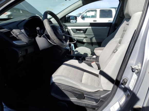2018 Honda CR-V LX with VIN 2HKRW6H35JH210704, listed as a Copart auction lot 47471065 with 104,928 mi miles and Salvage Title. Bid and sale history available at carsss.com. Image 7.