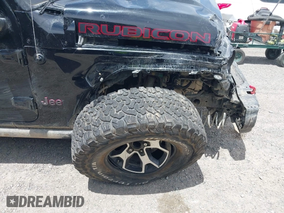 2022 Jeep Wrangler Unlimited Rubicon with VIN 1C4HJXFN2NW134024, listed as a IAAI auction lot 42248188 with 41,899 mi miles and . Bid and sale history available at DreamBid. Image 6.