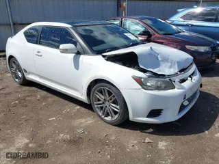 2011 Scion tC with VIN JTKJF5C73B3002330, listed as a IAAI auction lot 41864089 with 199,285 mi miles. Bid and sale history available at carsss.com. Image 1.