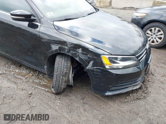 2015 Volkswagen Jetta Sedan 1.8T SE with VIN 3VWD17AJ3FM225093, listed as a IAAI auction lot 41974219 with 69,061 mi miles. Bid and sale history available at carsss.com. Image 6.