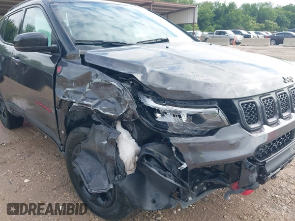 2023 Jeep Compass Trailhawk with VIN 3C4NJDDN9PT544283, listed as a IAAI auction lot 42393021 with 60,009 mi miles and . Bid and sale history available at DreamBid. Image 6.