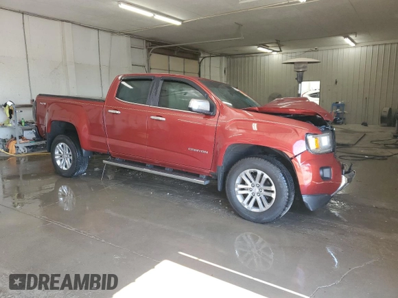 2016 GMC Canyon 4WD SLT z VIN 1GTG6DE30G1104614, wystawiony jako Copart lot #50416425 z przebiegiem 147 777 mil mil oraz Szkody całkowita. Historia ofert i sprzedaży dostępna na DreamBid. Obrazek 4.