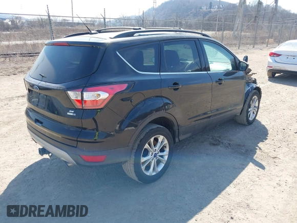 2017 Ford Escape SE with VIN 1FMCU9G98HUB94481, listed as a IAAI auction lot 41795259 with 114,209 mi miles. Bid and sale history available at carsss.com. Image 4.