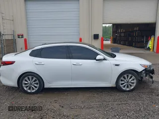 2018 Kia Optima LX z VIN 5XXGT4L3XJG246489, wystawiony jako IAAI lot #42107857 z przebiegiem 76 259 mil mil oraz . Historia ofert i sprzedaży dostępna na DreamBid. Obrazek 14.