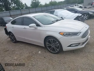 2017 Ford Fusion Titanium z VIN 3FA6P0D96HR239830, wystawiony jako IAAI lot #42741998 z przebiegiem 116 951 mil mil oraz . Historia ofert i sprzedaży dostępna na DreamBid. Obrazek 1.
