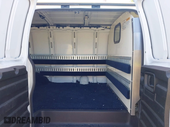 2018 Chevrolet Express Cargo with VIN 1GCWGAFPXJ1174685, listed as a IAAI auction lot 42577588 with 54,673 mi miles and . Bid and sale history available at DreamBid. Image 8.