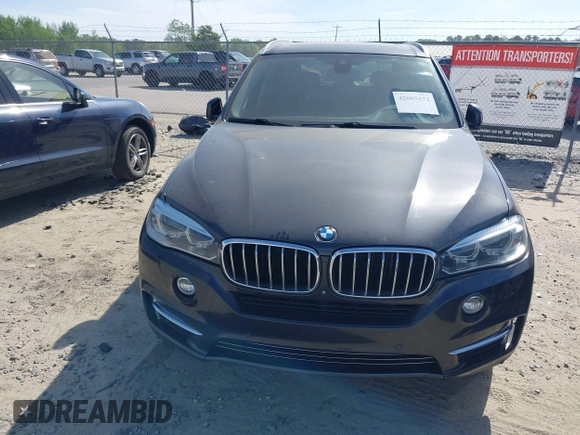 2014 BMW X5 xDrive35d with VIN 5UXKS4C57E0J93982, listed as a IAAI auction lot 42085173 with 169,908 mi miles. Bid and sale history available at carsss.com. Image 6.