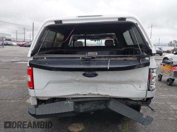 2018 Ford F-150 XL with VIN 1FTMF1CBXJKC83791, listed as a IAAI auction lot 41796119 with 196,611 mi miles. Bid and sale history available at carsss.com. Image 17.