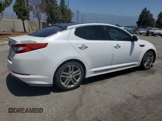 2013 Kia Optima SX z VIN 5XXGR4A60DG193592, wystawiony jako Copart lot #61274435 z przebiegiem 108 251 mil mil oraz Szkoda całkowita • Salvage title. Historia ofert i sprzedaży dostępna na DreamBid. Obrazek 3.