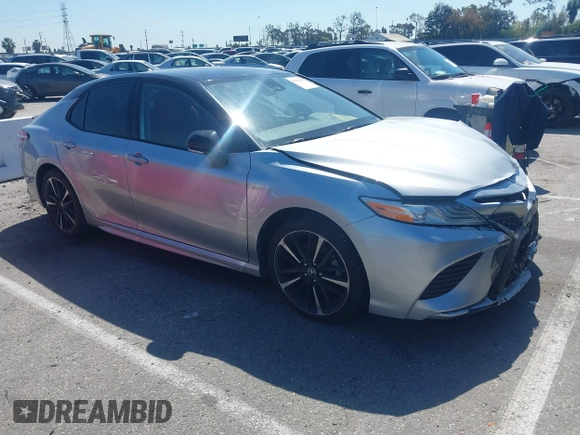 2020 Toyota Camry XSE with VIN 4T1K61AK1LU318098, listed as a IAAI auction lot 41838182 with 64,118 mi miles and . Bid and sale history available at DreamBid. Image 1.