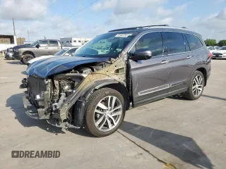 2016 Honda Pilot Touring with VIN 5FNYF5H90GB057392, listed as a Copart auction lot 61948785 with 109,227 mi miles and Salvage title. Bid and sale history available at DreamBid. Image 1.