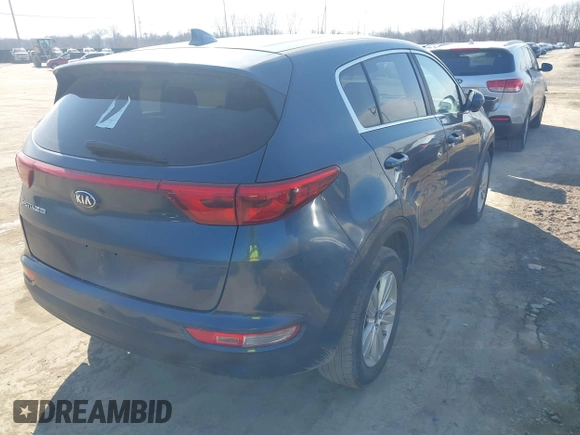 2018 Kia Sportage LX with VIN KNDPM3AC1J7453713, listed as a IAAI auction lot 41677259 with 165,792 mi miles and . Bid and sale history available at carsss.com. Image 4.