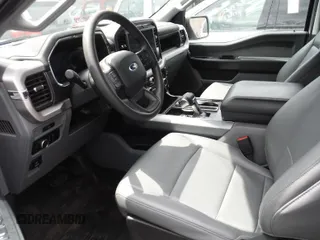 2023 Ford F-150 Lightning Pro with VIN 1FTVW1EL4PWG02842, listed as a IAAI auction lot 42240052 with 48,752 mi miles and . Bid and sale history available at DreamBid. Image 1.