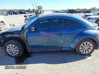 2019 Volkswagen Beetle S with VIN 3VWFD7AT7KM719095, listed as a IAAI auction lot 40919031 with 86,516 mi miles. Bid and sale history available at carsss.com. Image 15.