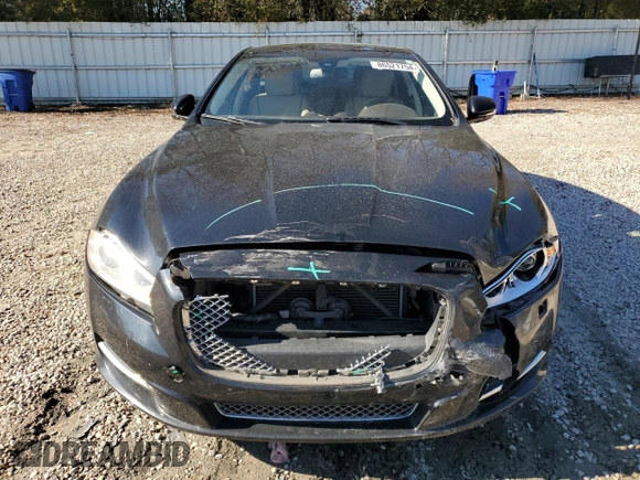 2015 Jaguar XJ with VIN SAJWA2GT8FMV83276, listed as a Copart auction lot 86521754 with 105,010 mi miles and Salvage Title. Bid and sale history available at DreamBid. Image 5.