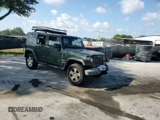 2008 Jeep Wrangler Unlimited Sahara with VIN 1J4GA59198L566019, listed as a Copart auction lot 53975965 with 184,612 mi miles and Salvage Title. Bid and sale history available at carsss.com. Image 14.