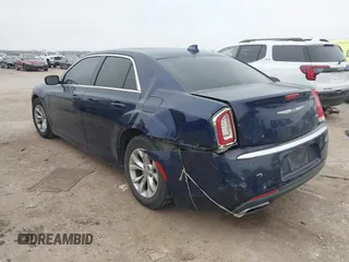 2015 Chrysler 300 Limited with VIN 2C3CCAAG5FH796498, listed as a IAAI auction lot 41520694 with 165,433 mi miles. Bid and sale history available at carsss.com. Image 3.