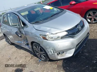 2016 Honda Fit EX z VIN JHMGK5H71GS001338, wystawiony jako IAAI lot #42143664 z przebiegiem 59 415 mil mil oraz . Historia ofert i sprzedaży dostępna na DreamBid. Obrazek 1.