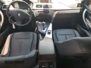 2013 BMW 3 Series 328i with VIN WBA3A5C57DF602652, listed as a Copart auction lot 60874345 with 147,214 mi miles and Salvage title. Bid and sale history available at DreamBid. Image 8.