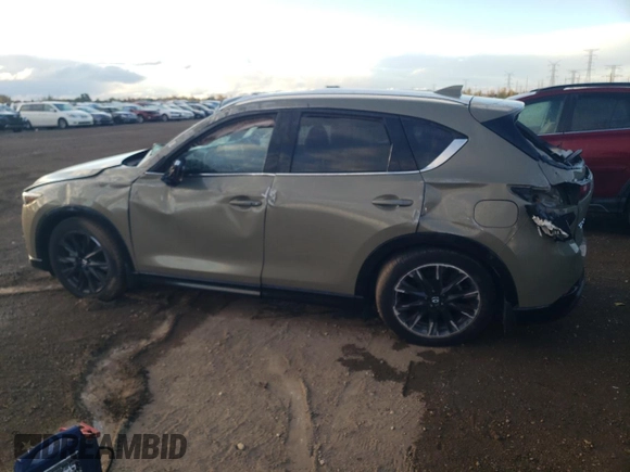 2024 Mazda CX-5 2.5 Carbon Turbo with VIN JM3KFBAY7R0358093, listed as a Copart auction lot 75492214 with 14,624 mi miles and Salvage Title. Bid and sale history available at carsss.com. Image 2.