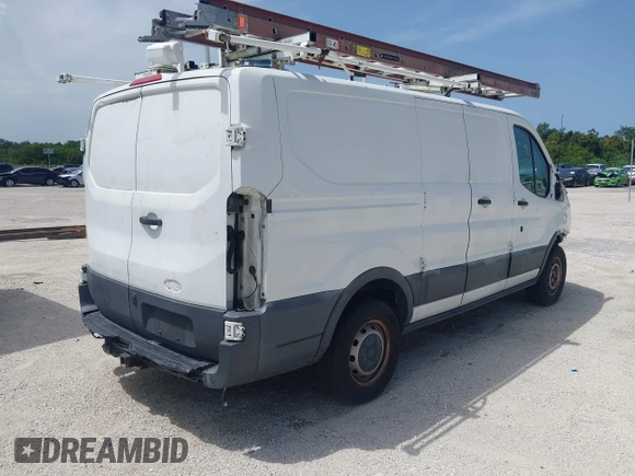 2015 Ford Transit Cargo with VIN 1FTNR1ZM9FKA50724, listed as a IAAI auction lot 42506872 with 155,117 mi miles and . Bid and sale history available at DreamBid. Image 4.