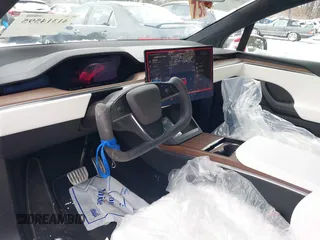 2023 Tesla Model X with VIN 7SAXCBE51PF404297, listed as a IAAI auction lot 41314595 with 25,020 mi miles and . Bid and sale history available at DreamBid. Image 5.