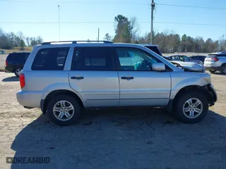 2003 Honda Pilot EX with VIN 2HKYF18683H579746, listed as a IAAI auction lot 41206240 with 196,467 mi miles. Bid and sale history available at carsss.com. Image 13.