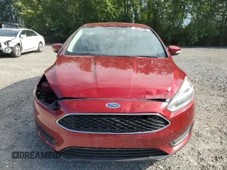 2015 Ford Focus SE with VIN 1FADP3F24FL386359, listed as a Copart auction lot 63519185 with 114,079 mi miles and Salvage title. Bid and sale history available at DreamBid. Image 5.