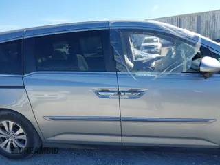 2016 Honda Odyssey EX-L with VIN 5FNRL5H67GB023727, listed as a IAAI auction lot 41673026 with Not Provided miles. Bid and sale history available at carsss.com. Image 12.