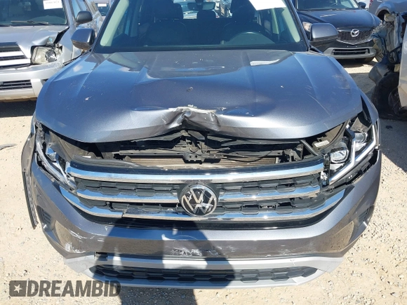 2021 Volkswagen Atlas SE z VIN 1V2DP2CA3MC518670, wystawiony jako IAAI lot #41860811 z przebiegiem 69 270 mil mil oraz . Historia ofert i sprzedaży dostępna na DreamBid. Obrazek 6.