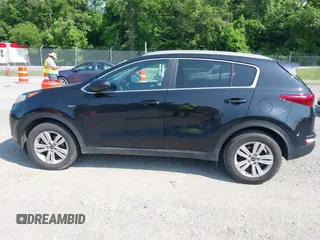 2017 Kia Sportage LX z VIN KNDPMCAC1H7285906, wystawiony jako IAAI lot #42399031 z przebiegiem 142 909 mil mil oraz . Historia ofert i sprzedaży dostępna na DreamBid. Obrazek 14.