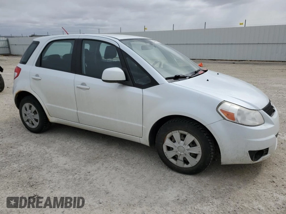 2010 Suzuki SX4 with VIN JS2YA5A13A6300320, listed as a Copart auction lot 53058375 with 259,428 mi miles and Salvage Title. Bid and sale history available at DreamBid. Image 4.