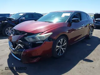 2016 Nissan Maxima SL with VIN 1N4AA6AP0GC426365, listed as a IAAI auction lot 42054030 with 165,557 mi miles and . Bid and sale history available at DreamBid. Image 18.