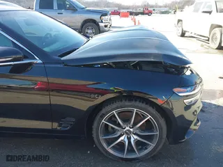 2022 Genesis G70 2.0T with VIN KMTG34TA0NU098580, listed as a IAAI auction lot 41763511 with 87,816 mi miles. Bid and sale history available at carsss.com. Image 18.